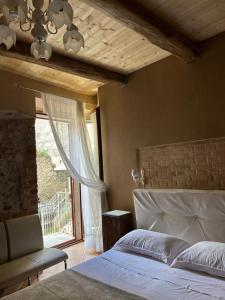 Postel nebo postele na pokoji v ubytování B&B Casa CamiLory