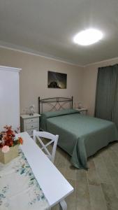 Agriturismo Maremma Amara客房内的一张或多张床位