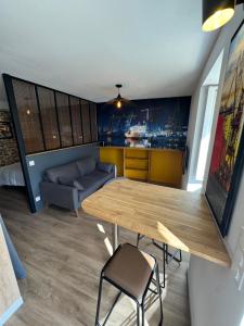 Posezení v ubytování Studio cosy Bretagne sud