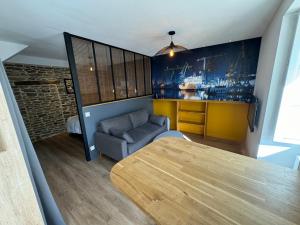 Posezení v ubytování Studio cosy Bretagne sud