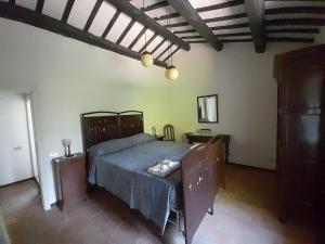 Ένα ή περισσότερα κρεβάτια σε δωμάτιο στο Agriturismo del Frontino- Ca'Tognino