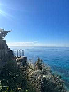 a view of the ocean from a bluff at B&B Casa CamiLory in San Lucido