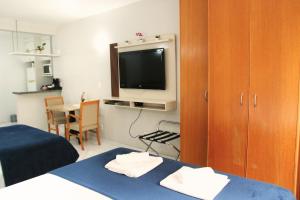 Katil atau katil-katil dalam bilik di Flats em frente ao Allianz Parque - HOTEL EM PERDIZES