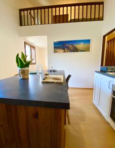 Η κουζίνα ή μικρή κουζίνα στο Le coin cosy des 4 têtes - balcon - vue montagnes - proche centre & gare