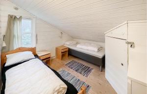 Ένα ή περισσότερα κρεβάτια σε δωμάτιο στο Amazing Home In Øyer With Sauna
