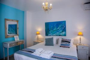 Ένα ή περισσότερα κρεβάτια σε δωμάτιο στο Thasos Blue Apartments 