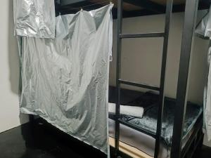 Postel nebo postele na pokoji v ubytování While away วายล์ อะเวย์