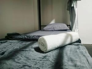 Postel nebo postele na pokoji v ubytování While away วายล์ อะเวย์