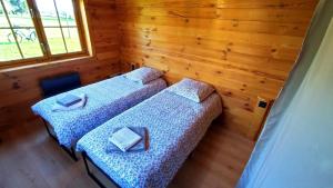 Ένα ή περισσότερα κρεβάτια σε δωμάτιο στο Le chalet de la presle