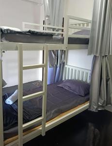 Postel nebo postele na pokoji v ubytování While away วายล์ อะเวย์