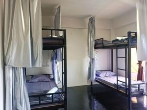 Postel nebo postele na pokoji v ubytování While away วายล์ อะเวย์