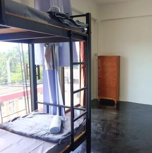 Postel nebo postele na pokoji v ubytování While away วายล์ อะเวย์