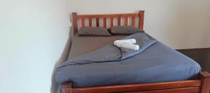 Postel nebo postele na pokoji v ubytování While away วายล์ อะเวย์