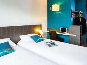 Postel nebo postele na pokoji v ubytování Ibis Styles Lyon Centre - Gare Part Dieu