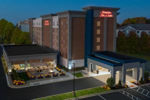 a rendering of a hotel building with a restaurant at Hampton Inn & Suites Cleveland-Beachwood in Beachwood