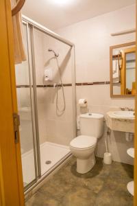 Kúpeľňa v ubytovaní Apartamentos Playa De Cóbreces