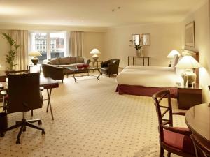 Ένα ή περισσότερα κρεβάτια σε δωμάτιο στο Hilton Antwerp Old Town