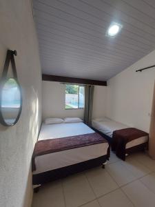 Fotografie z fotogalerie ubytování Quarto em Guarapari a 5 min da praia de Peracanga e Bacutia - Litoral Sul v destinaci Guarapari