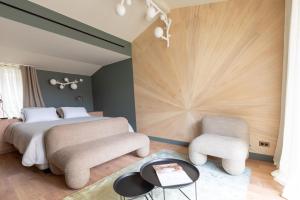Postel nebo postele na pokoji v ubytování Yndo Hôtel