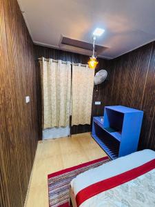 Ένα ή περισσότερα κρεβάτια σε δωμάτιο στο Hotel Amar