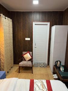 Ένα ή περισσότερα κρεβάτια σε δωμάτιο στο Hotel Amar