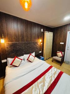 Ένα ή περισσότερα κρεβάτια σε δωμάτιο στο Hotel Amar