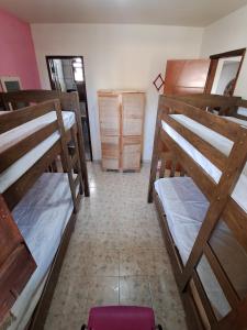 Postel nebo postele na pokoji v ubytování Pontal Hostel Ilhéus