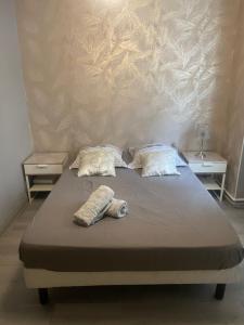 Postel nebo postele na pokoji v ubytování Appartement Familial PARIS PORTE LA VILETTE