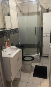 Koupelna v ubytování Appartement Familial PARIS PORTE LA VILETTE