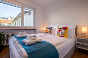 Postelja oz. postelje v sobi nastanitve Special PRIMERO PICASSO Apartment Basel, Bahnhof Grossbasel 10-STAR
