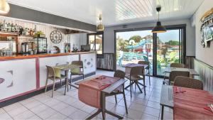 Restaurace v ubytování Camping Ushuaïa Villages Le Parc de la Grève