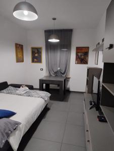 Ένα ή περισσότερα κρεβάτια σε δωμάτιο στο Urban Chic Apartament