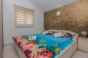 Posteľ alebo postele v izbe v ubytovaní Apartments Lucica
