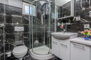 Kúpeľňa v ubytovaní Apartments Lucica