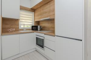 Kuchyňa alebo kuchynka v ubytovaní Apartments Lucica