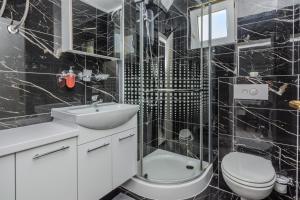 Kúpeľňa v ubytovaní Apartments Lucica