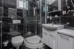 Kúpeľňa v ubytovaní Apartments Lucica