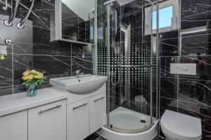Kúpeľňa v ubytovaní Apartments Lucica