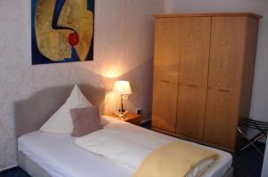 Postel nebo postele na pokoji v ubytování Hotel Mietz