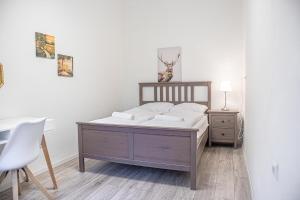 Voodi või voodid majutusasutuse Delightful 2BR Apt.-Near Wiener Stadthalle toas