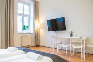 Voodi või voodid majutusasutuse Delightful 2BR Apt.-Near Wiener Stadthalle toas