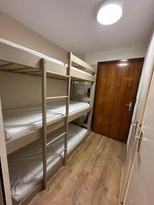 Postel nebo postele na pokoji v ubytování Appartement Chamrousse le Vernon