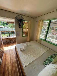 Postel nebo postele na pokoji v ubytování BFF Backpacker's Inn