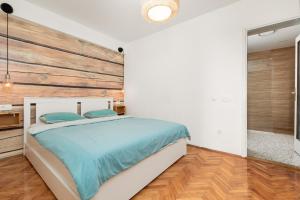 Posteľ alebo postele v izbe v ubytovaní Apartment Iskra by El-Pi Tours