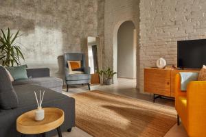 TV a/nebo společenská místnost v ubytování Butik Art Hotel