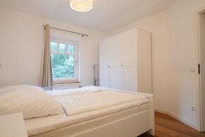 Katil atau katil-katil dalam bilik di Berensch Holiday Fewo Brigitta