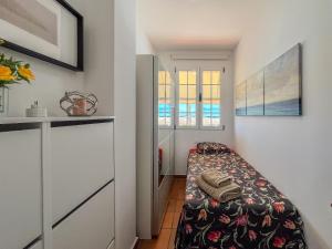 a small room with a bed in the corner at Villa Montaña Negra III in San Bartolomé de Tirajana +34 photos