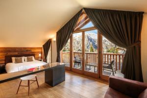 Postel nebo postele na pokoji v ubytování Montana Lodge & Spa, by R Collection Hotels