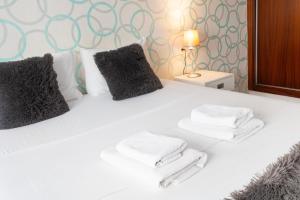 Postel nebo postele na pokoji v ubytování Stay U-nique Apartments Salitre