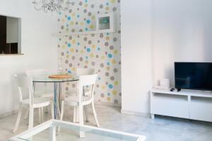 TV a/nebo společenská místnost v ubytování Stay U-nique Apartments Salitre